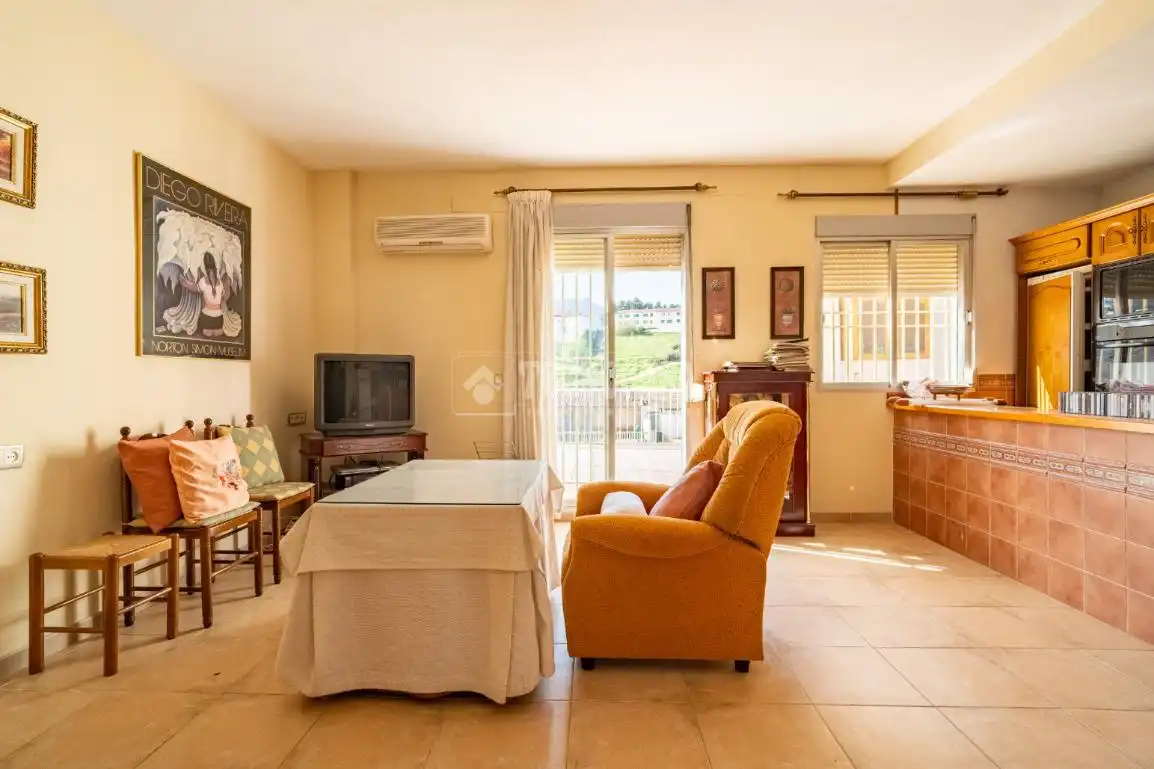 Sala de estar de Casa adosada en venta en Iznalloz con Aire acondicionado