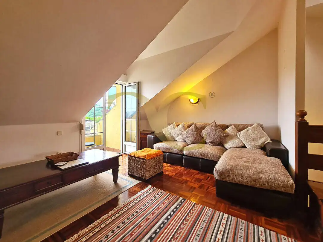 Sala de estar de Casa adosada en venta en Ribadesella con Calefacción, Trastero y Amueblado