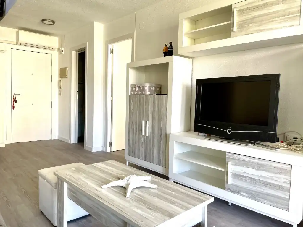 Wohnzimmer von Wohnungen zur Miete in Benicasim / Benicàssim mit Klimaanlage, Privatgarten und Terrasse