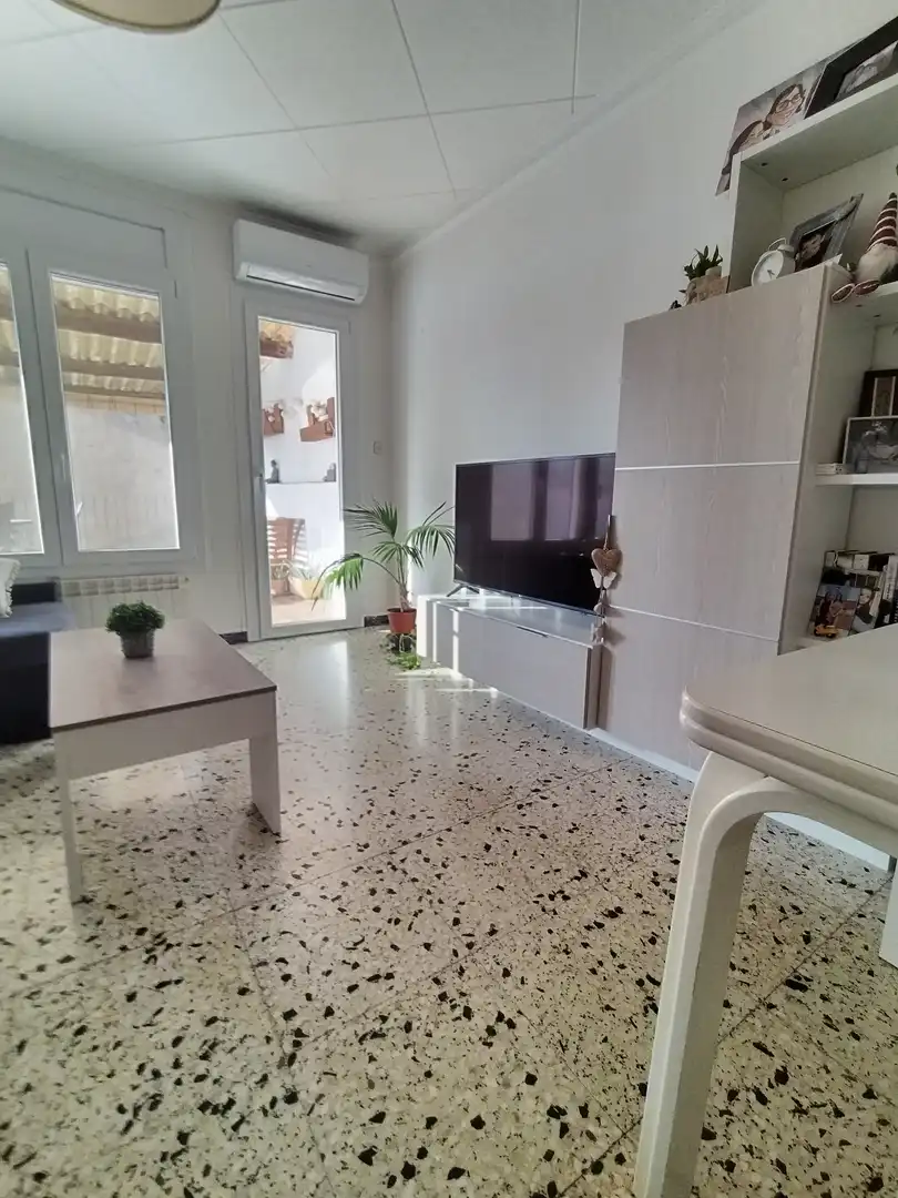 Wohnzimmer von Einfamilien-Reihenhaus zum Verkauf in Anglesola mit Klimaanlage, Heizung und Terrasse