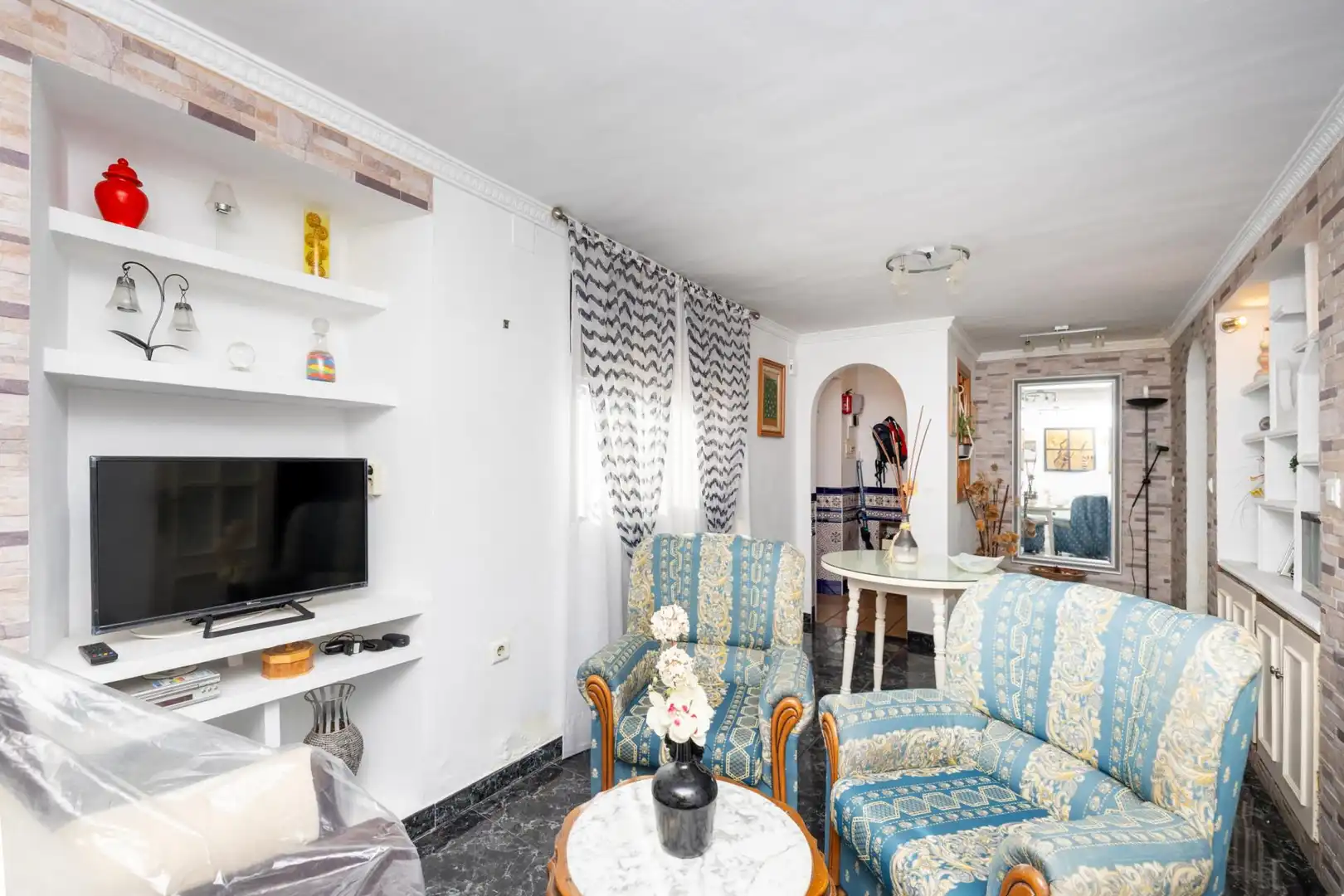 Sala d'estar de Casa adosada en venda en Loja