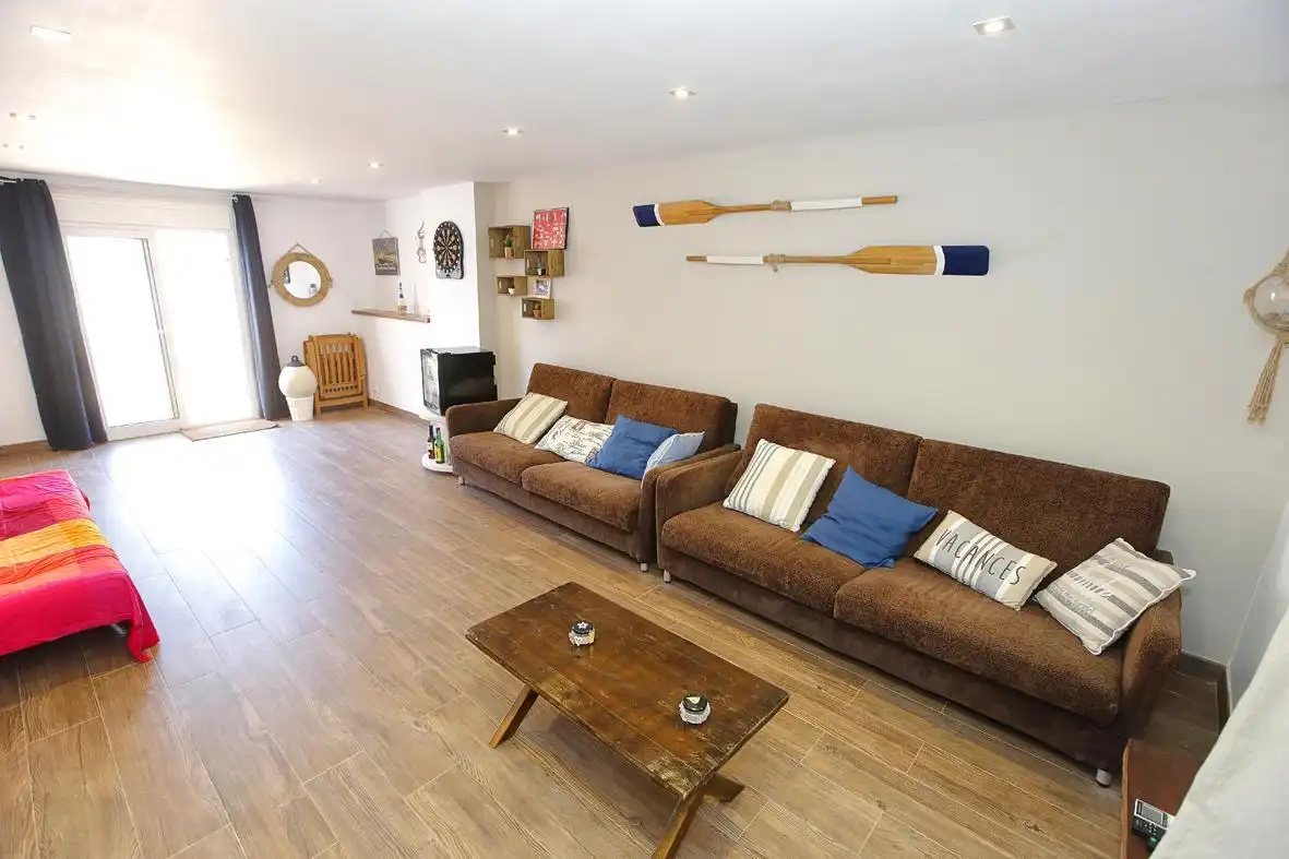 Sala de estar de Casa adosada en venta en Alcanar con Calefacción, Jardín privado y Terraza