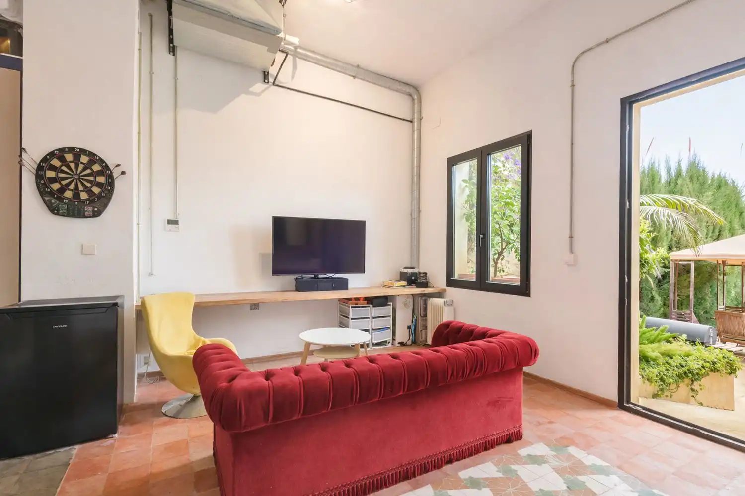 Sala d'estar de Casa adosada en venda en Alicante / Alacant amb Aire condicionat, Jardí privat i Terrassa