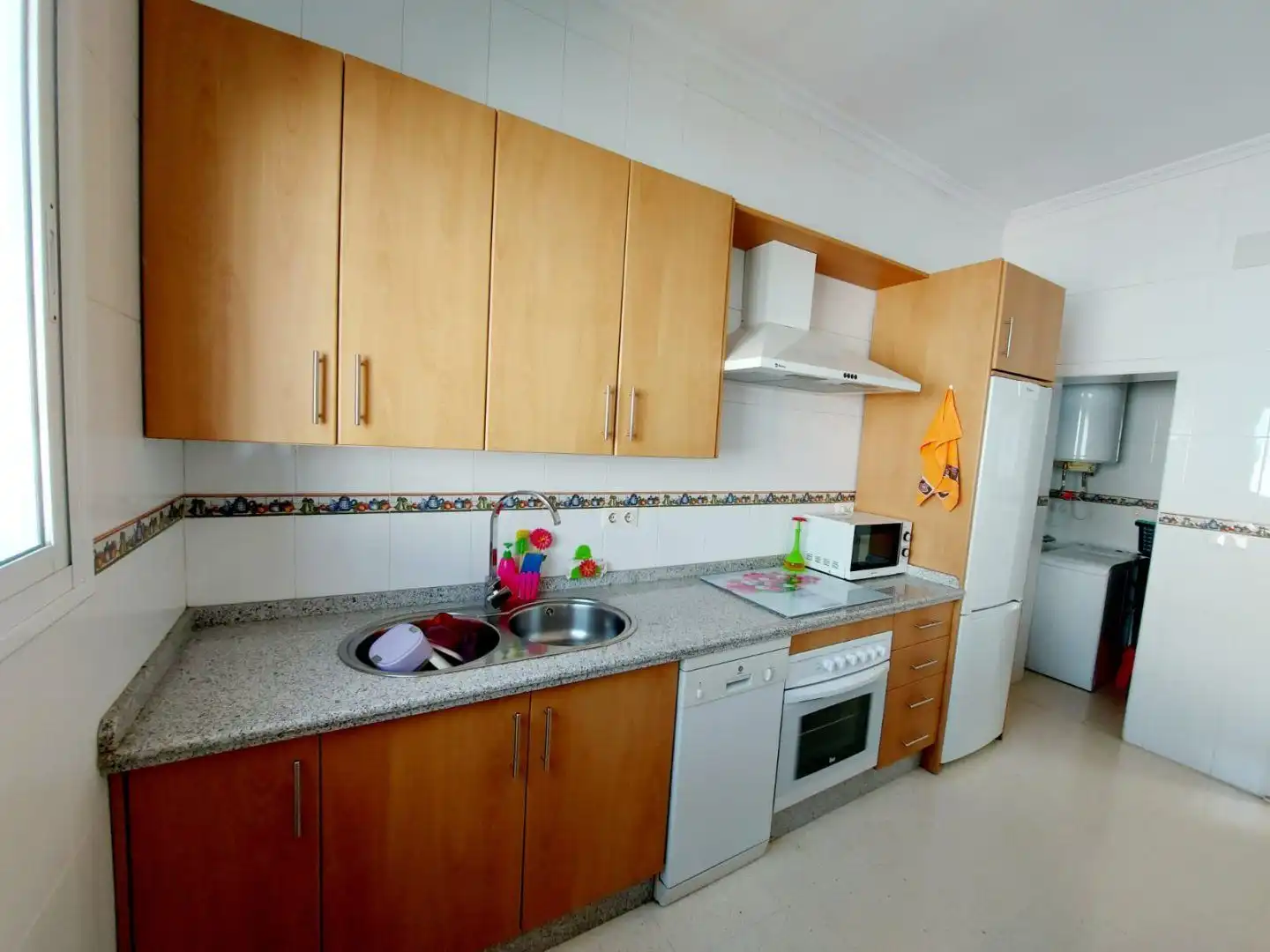 Kitchen of Flat for sale in Brenes  with Air Conditioner, Storage room and Balcony