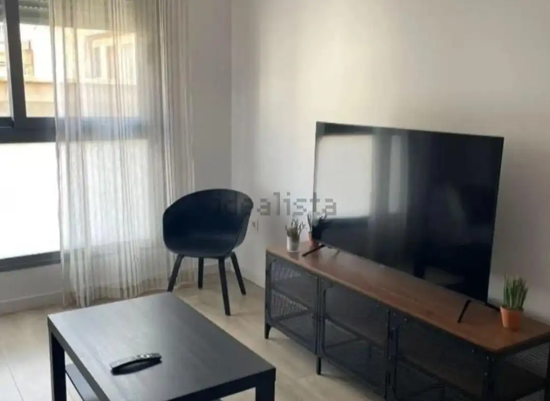 Sala d'estar de Pis de lloguer en Almería amb Aire condicionat i Moblat