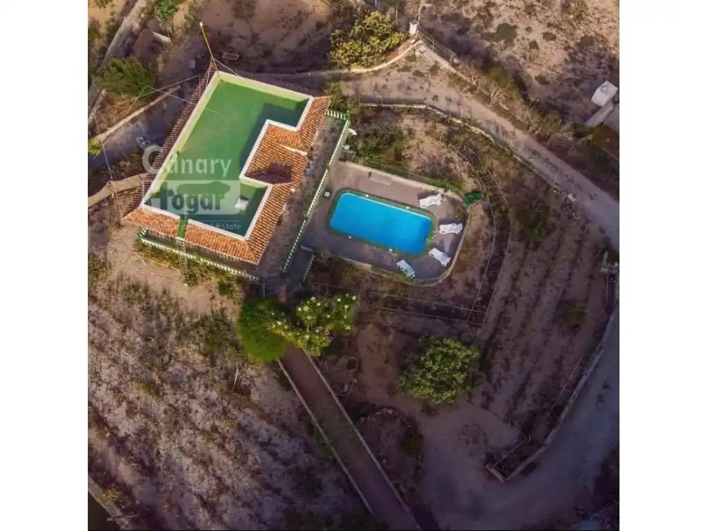 Casa rústica con piscina en venta en Los Blanquitos