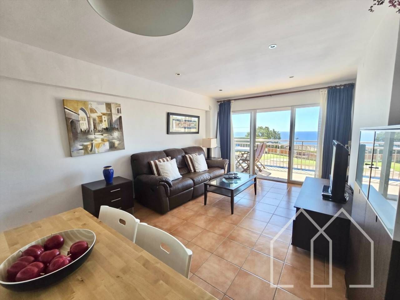 Living room of Flat for sale in Sant Feliu de Guíxols  with Air Conditioner, Private garden and Swimming Pool