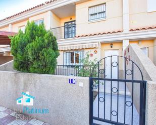 Exterior view of Single-family semi-detached for sale in Águilas  with Air Conditioner, Terrace and Swimming Pool