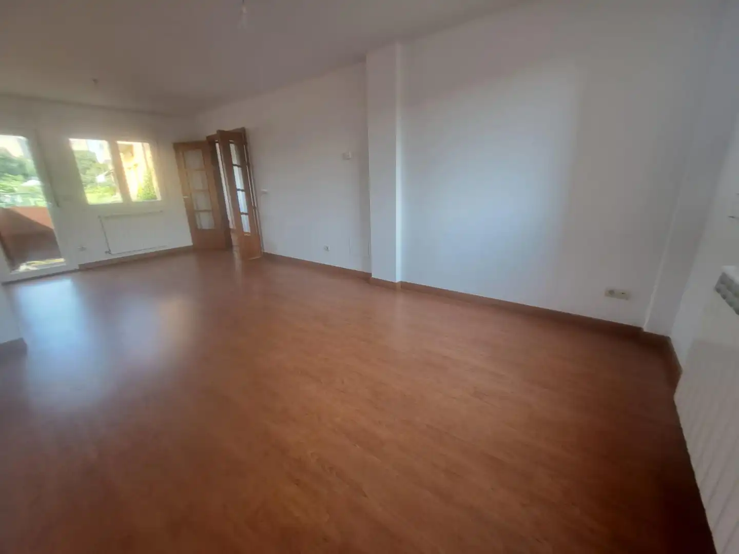 Sala de estar de Casa adosada en venta en Bembibre con Calefacción, Terraza y Balcón