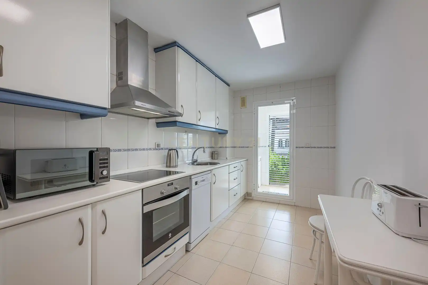 Kitchen of Apartments for sale in Marbella  with Air Conditioner, Swimming Pool and Washing machine