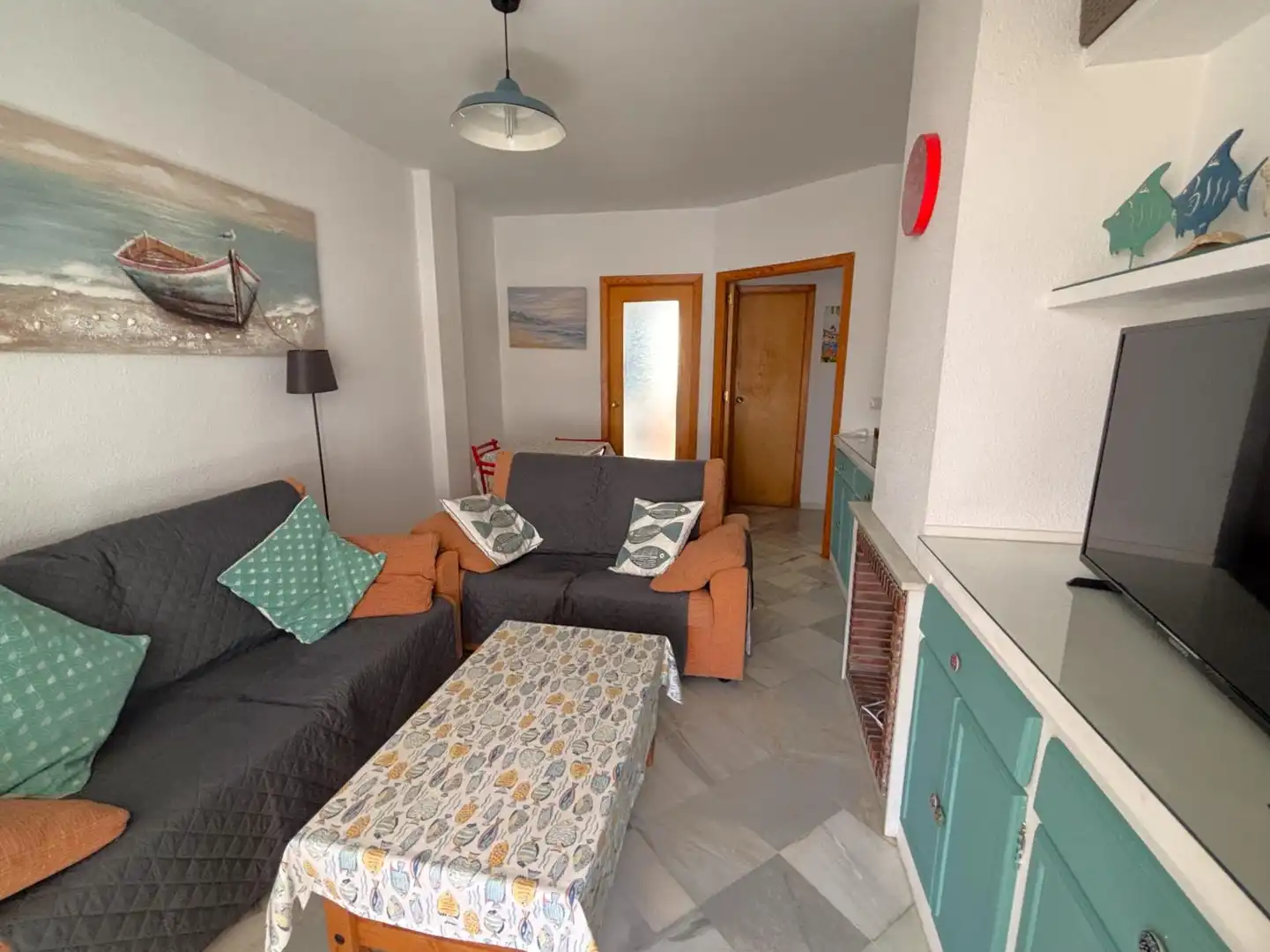 Sala de estar de Piso en venta en El Portil con Calefacción, Terraza y Piscina