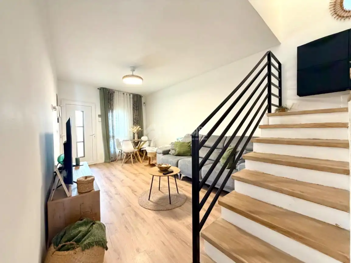 Sala de estar de Casa adosada en venta en Arganda del Rey con Calefacción y Terraza