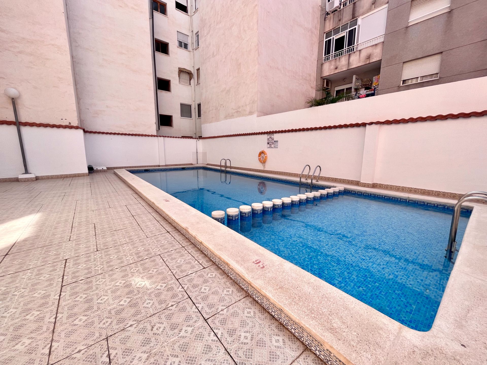 Swimming pool of Flat for sale in Torrevieja  with Air Conditioner, Heating and Terrace