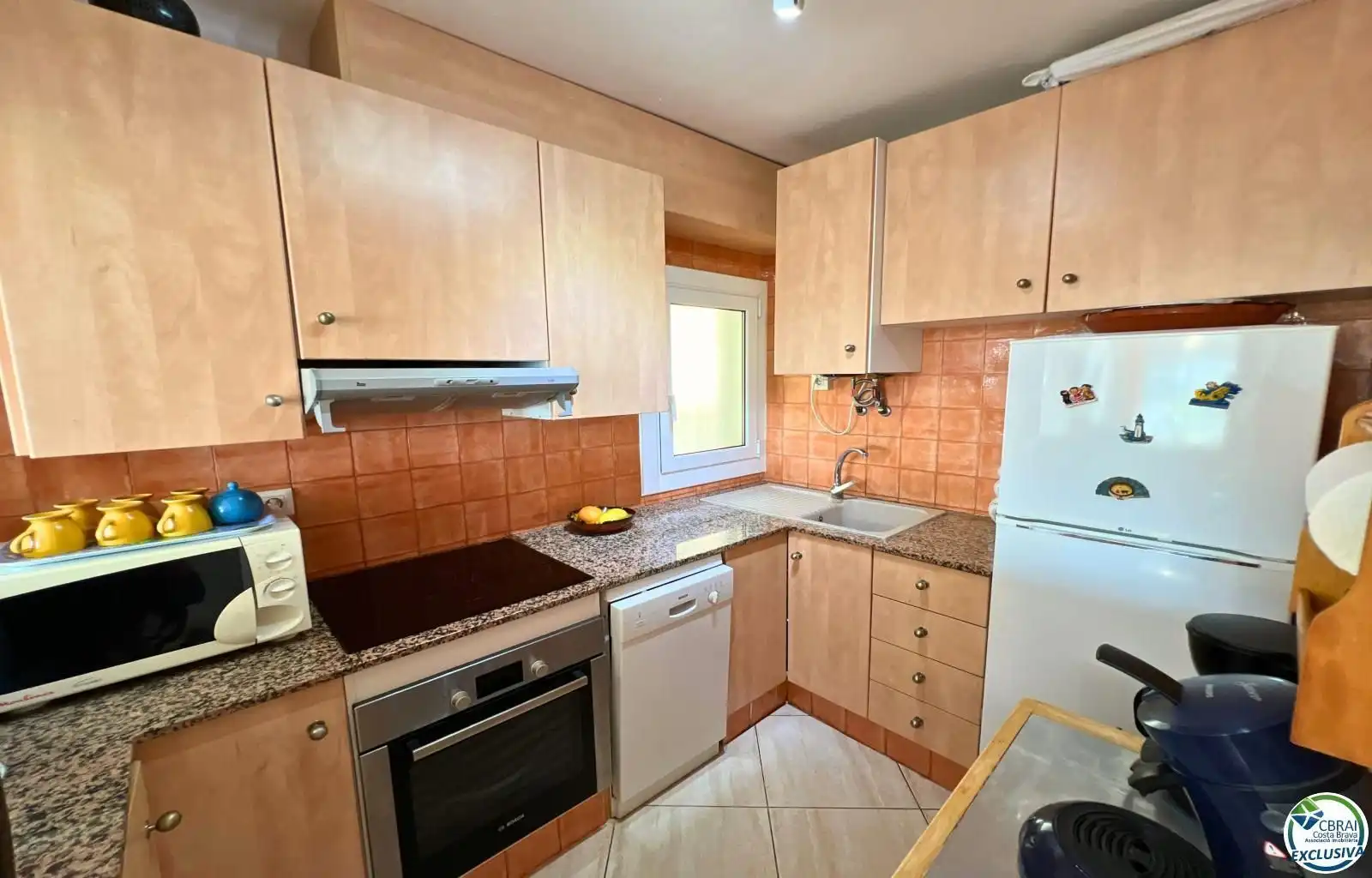 Cuina de Apartament en venda en Roses amb Terrassa, Traster i Moblat