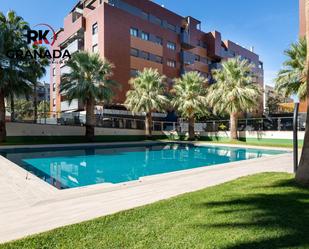 Swimming pool of Flat for sale in  Granada Capital  with Air Conditioner, Heating and Parquet flooring