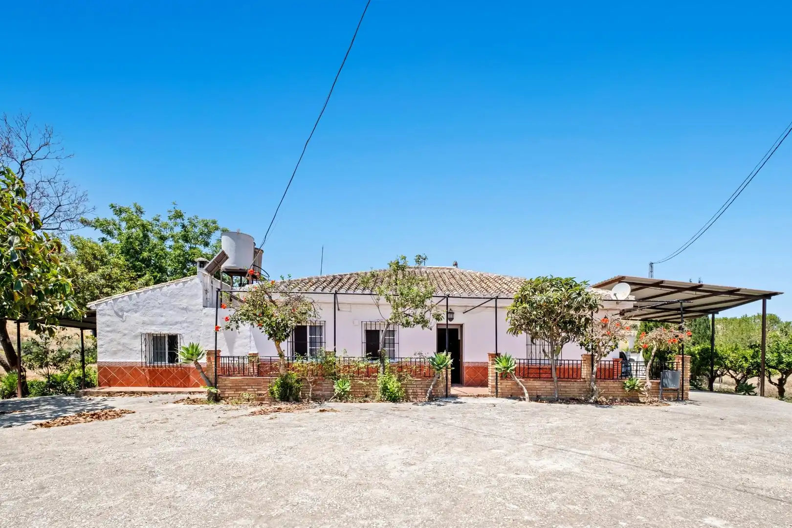 Vista exterior de Casa o xalet en venda en Pizarra amb Calefacció, Jardí privat i Terrassa