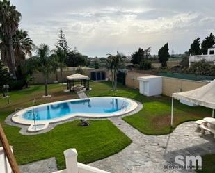 Swimming pool of House or chalet for sale in Chipiona  with Private garden, Storage room and Swimming Pool