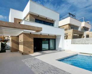 Exterior view of House or chalet for sale in San Miguel de Salinas  with Air Conditioner, Terrace and Swimming Pool