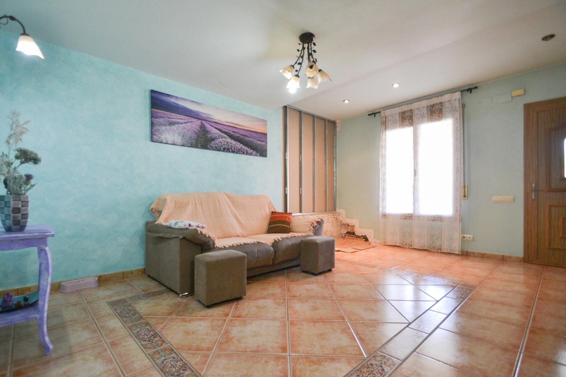 Sala d'estar de Casa o xalet en venda en Deltebre amb Aire condicionat, Jardí privat i Terrassa