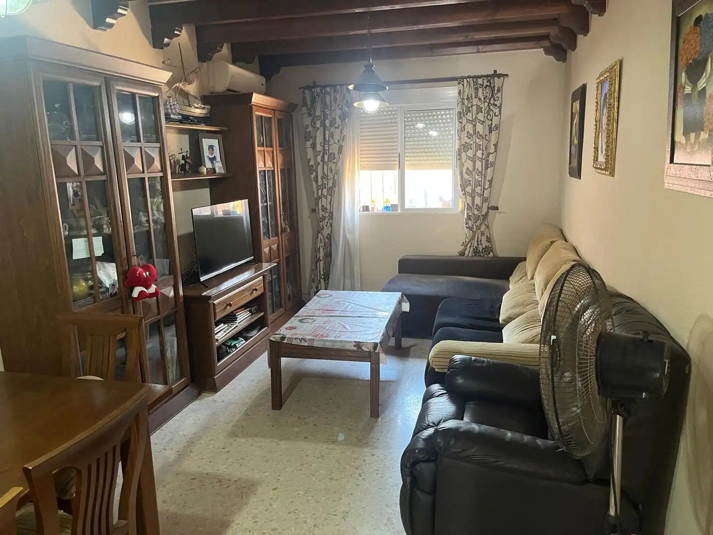 Sala de estar de Casa adosada en venta en La Rinconada con Aire acondicionado y Terraza