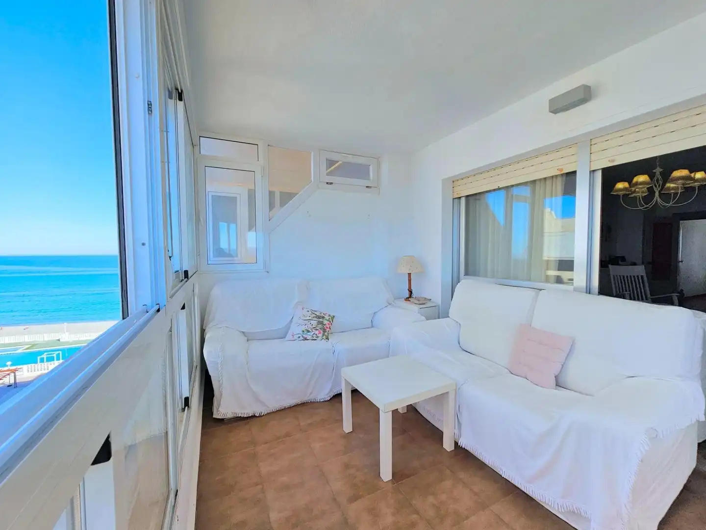 Sala de estar de Piso en venta en La Manga del Mar Menor con Terraza y Piscina comunitaria