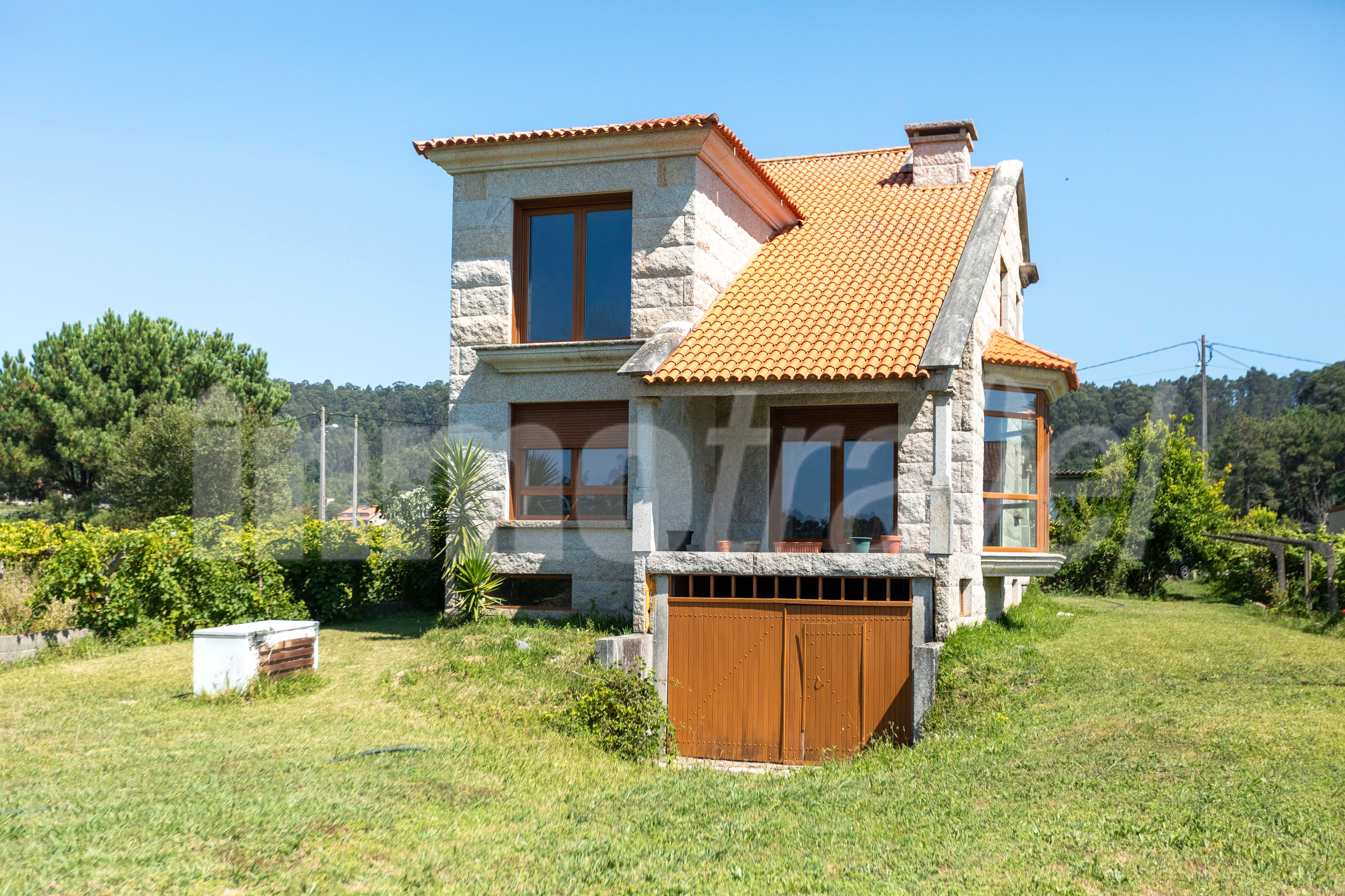 Exterior view of House or chalet for sale in Sanxenxo  with Private garden and Terrace