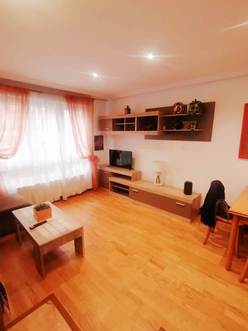 Living room of Apartment for sale in Gijón   with Heating, Parquet flooring and Storage room