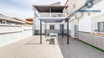Vista exterior de Casa adosada en venda en Peligros amb Aire condicionat i Jardí privat
