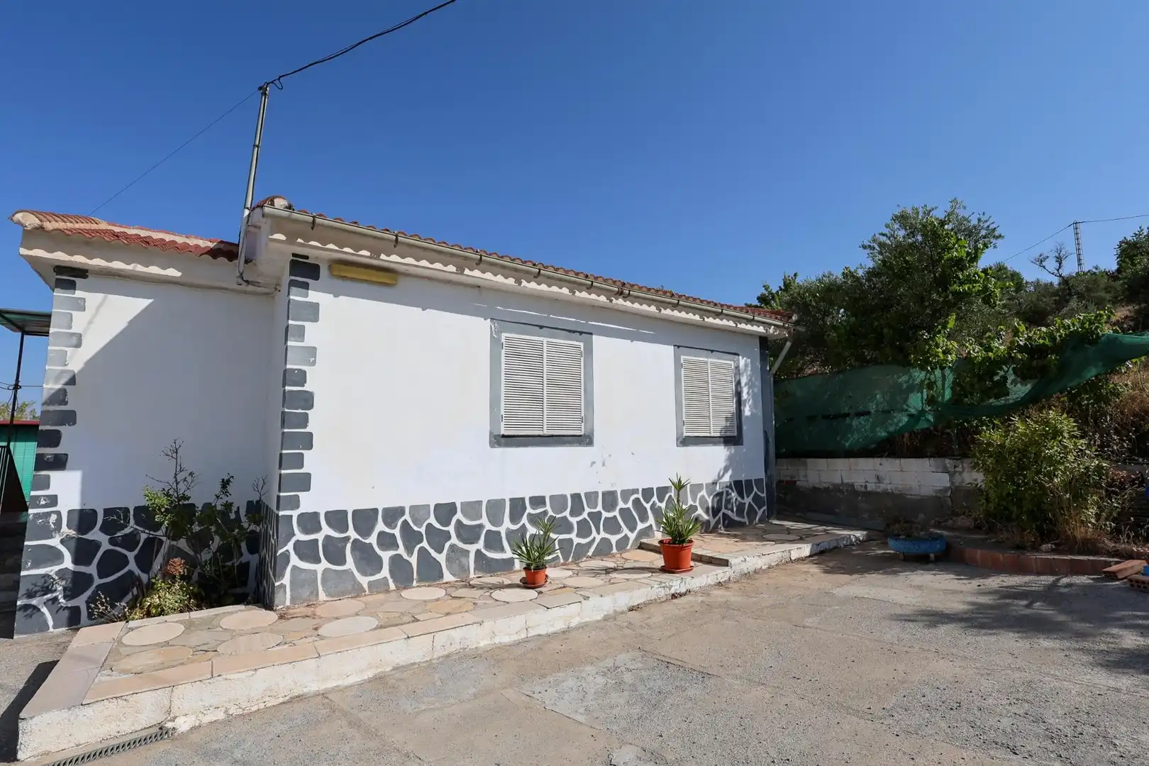 Vista exterior de Casa o xalet en venda en Cogollos de la Vega amb Piscina