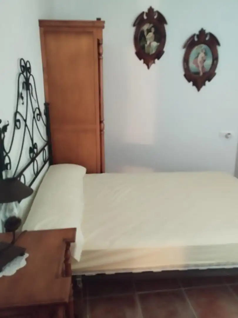 Dormitori de Casa adosada en venda en Tolox amb Moblat