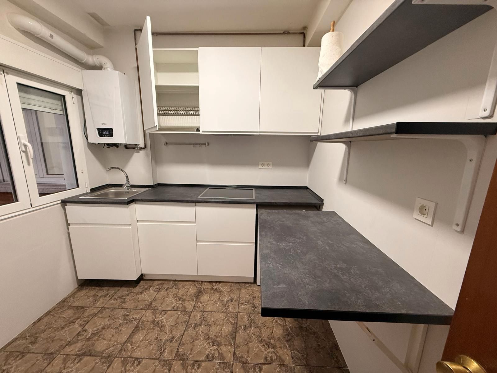 Kitchen of Flat for sale in Oviedo   with Heating and Storage room