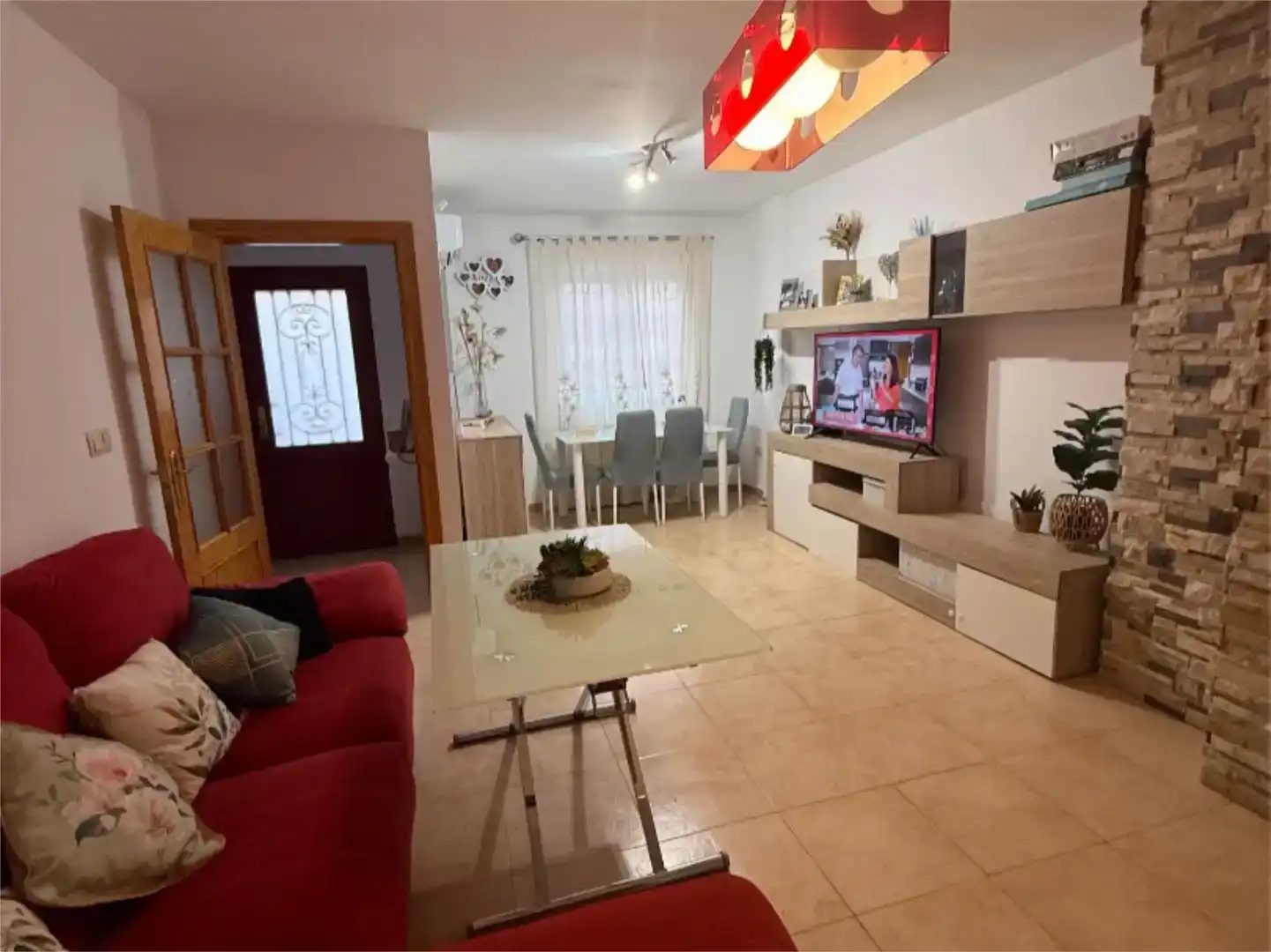 Sala d'estar de Casa adosada en venda en Alfacar amb Aire condicionat, Parquet i Piscina