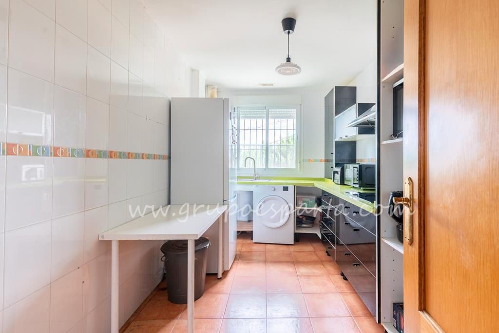 Kitchen of Duplex for sale in Sanlúcar la Mayor  with Air Conditioner, Storage room and Community pool