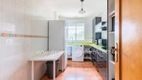 Kitchen of Duplex for sale in Sanlúcar la Mayor  with Air Conditioner, Storage room and Community pool