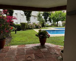 Jardí de Apartament de lloguer en Caldes d'Estrac amb Calefacció, Terrassa i Piscina