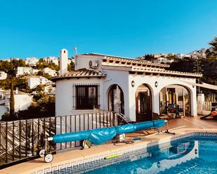 Vista exterior de Casa o xalet en venda en El Ràfol d'Almúnia amb Aire condicionat, Calefacció i Jardí privat