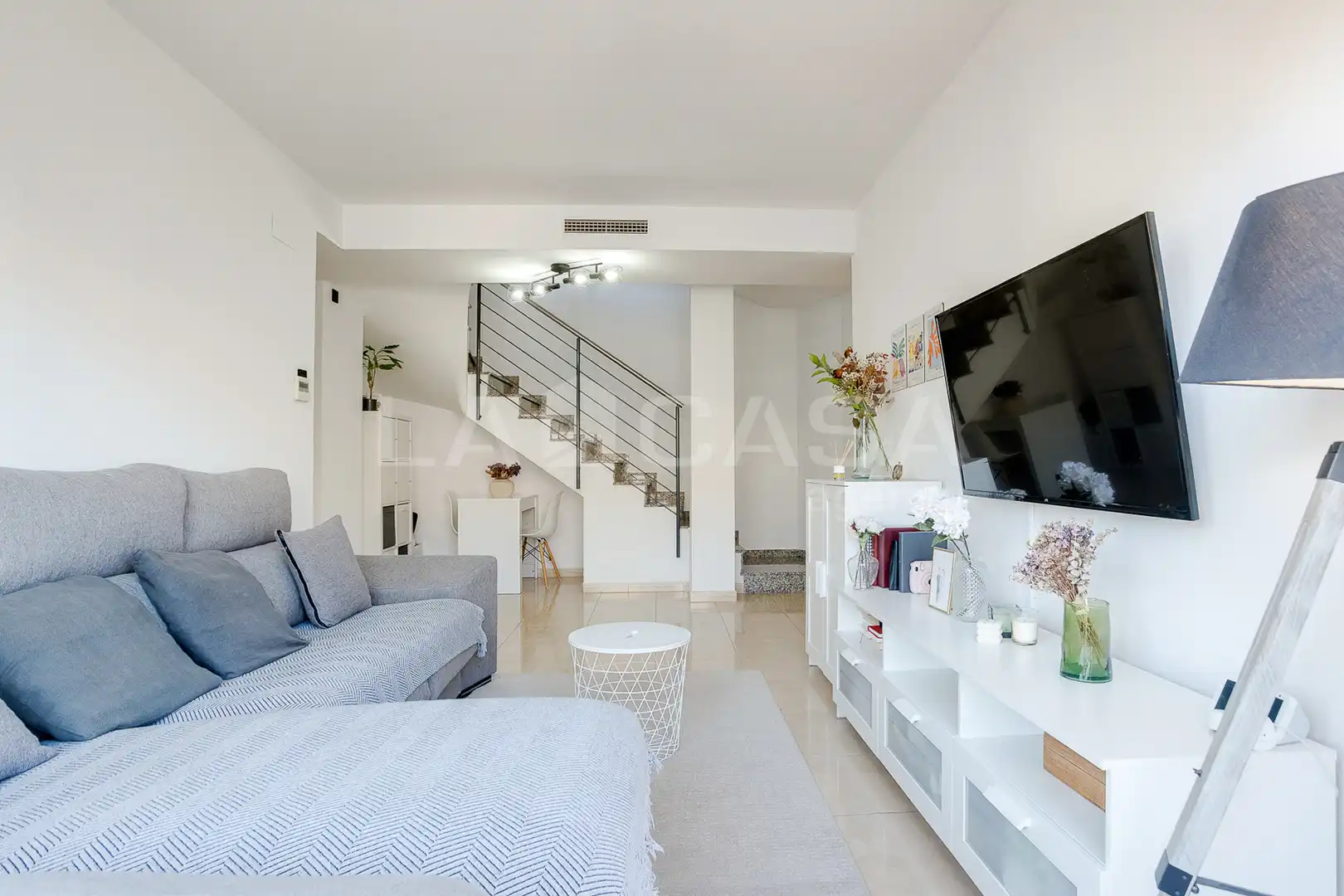 Sala de estar de Dúplex en venta en Les Franqueses del Vallès con Aire acondicionado, Calefacción y Parquet