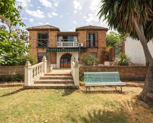 Exterior view of House or chalet for sale in  Granada Capital  with Terrace and Swimming Pool