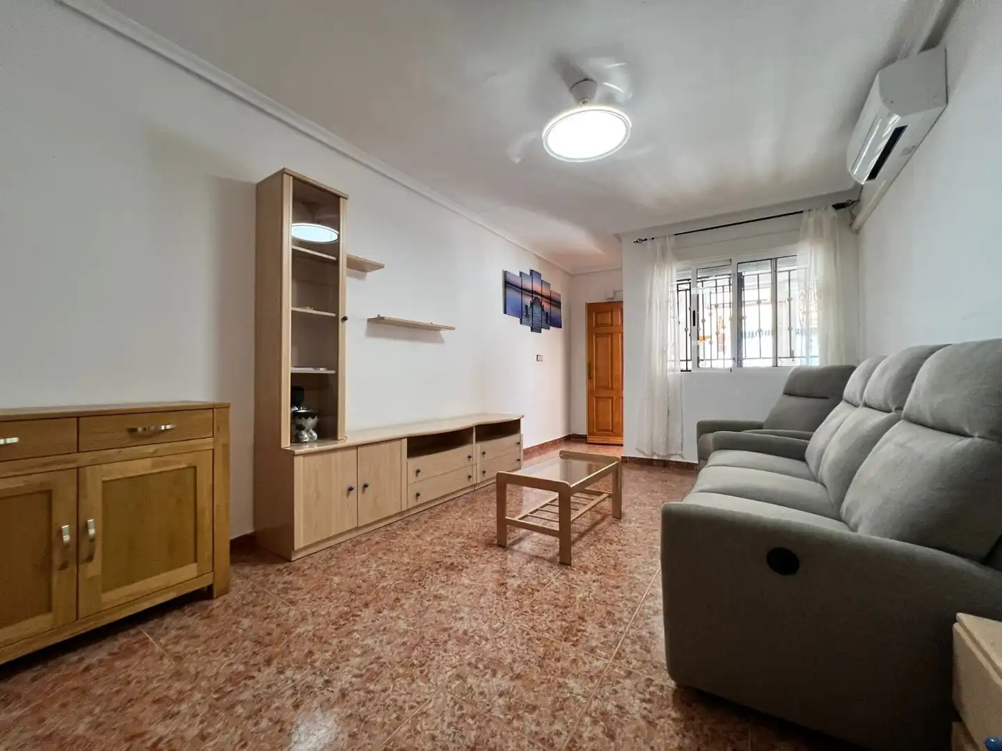 Sala de estar de Planta baja en venta en Orihuela con Aire acondicionado, Terraza y Piscina