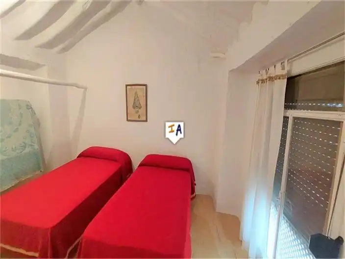 Schlafzimmer von Einfamilien-Reihenhaus zum Verkauf in Almedinilla mit Abstellraum