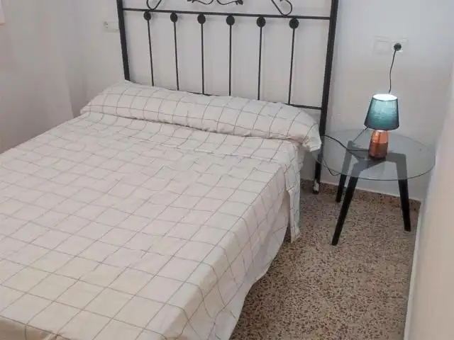 Bedroom of Flat for sale in Tavernes de la Valldigna  with Air Conditioner, Terrace and Furnished