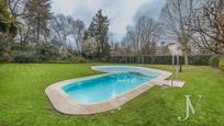 Swimming pool of Flat for sale in  Madrid Capital  with Air Conditioner, Heating and Parquet flooring