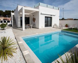 Swimming pool of Duplex for sale in Pilar de la Horadada  with Air Conditioner, Private garden and Terrace