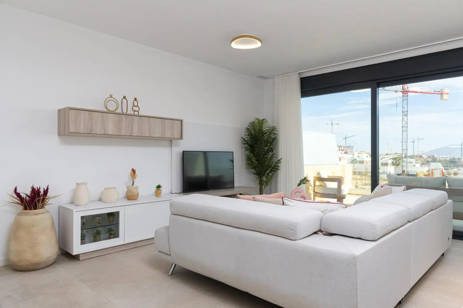 Sala de estar de Estudio en venta en Finestrat con Piscina comunitaria