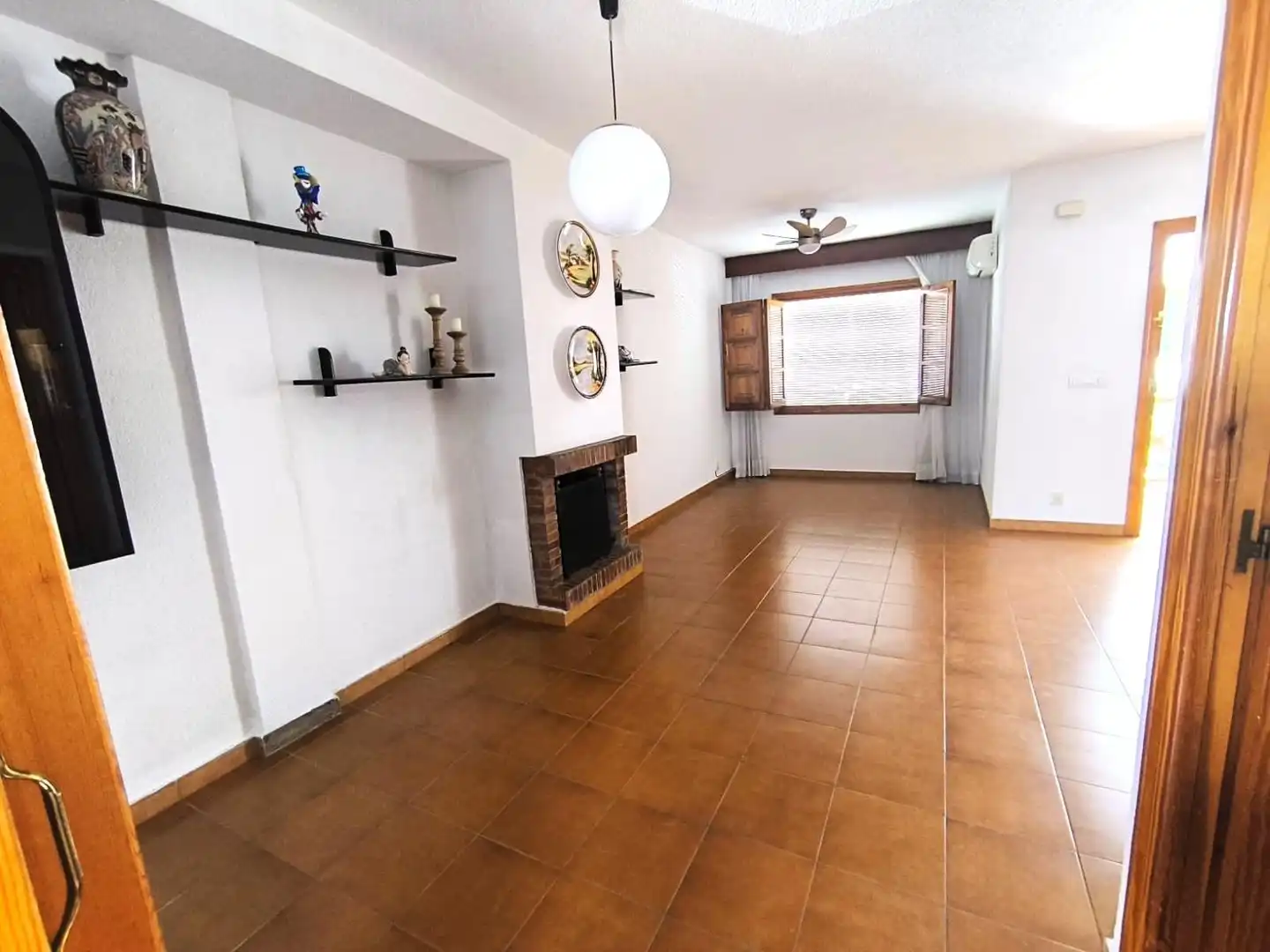 Sala de estar de Casa adosada en venta en Punta Umbría con Aire acondicionado y Balcón