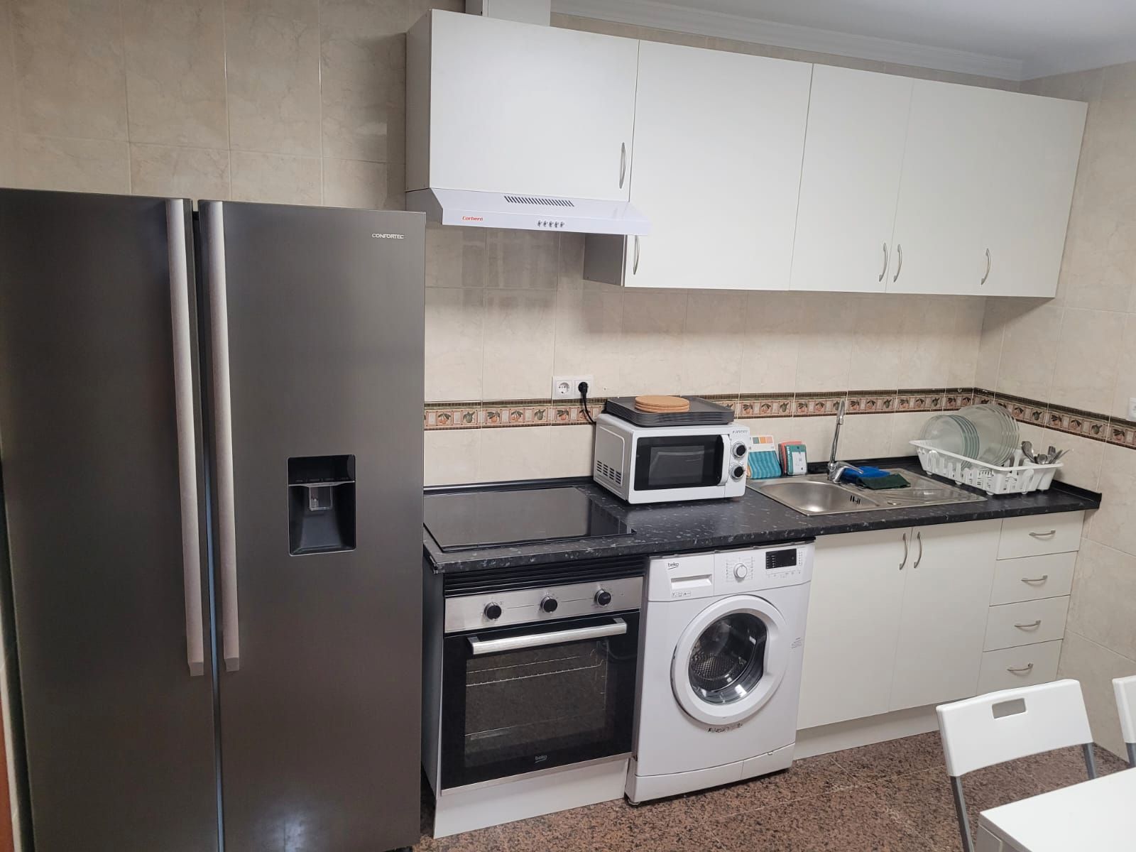 Cuina de Casa adosada en venda en Málaga Capital amb Aire condicionat i Moblat