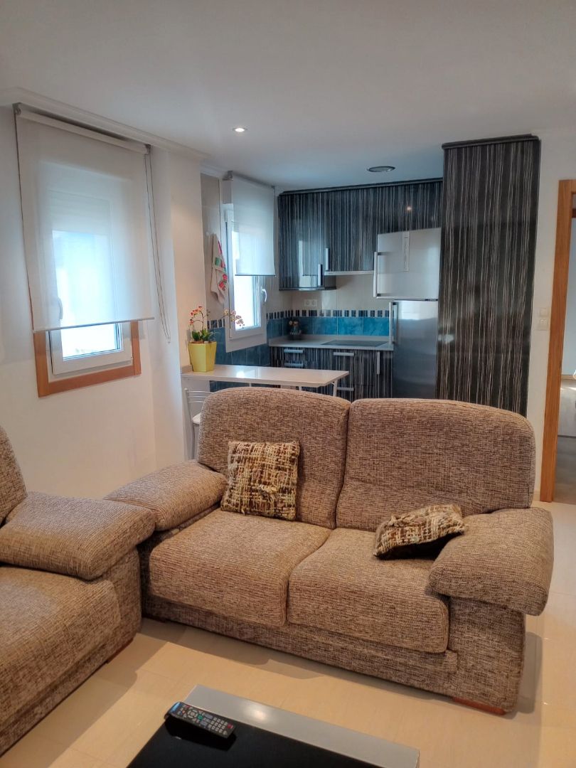 Sala d'estar de Apartament de lloguer en Cervo amb Moblat