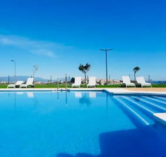 Swimming pool of Flat for sale in Manilva  with Air Conditioner, Heating and Terrace