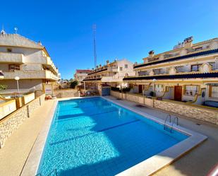 Piscina de Casa adosada de lloguer en Orihuela amb Aire condicionat, Terrassa i Moblat