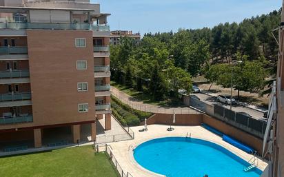 Swimming pool of Flat for sale in  Madrid Capital  with Air Conditioner, Private garden and Parquet flooring